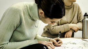 Student som skriver